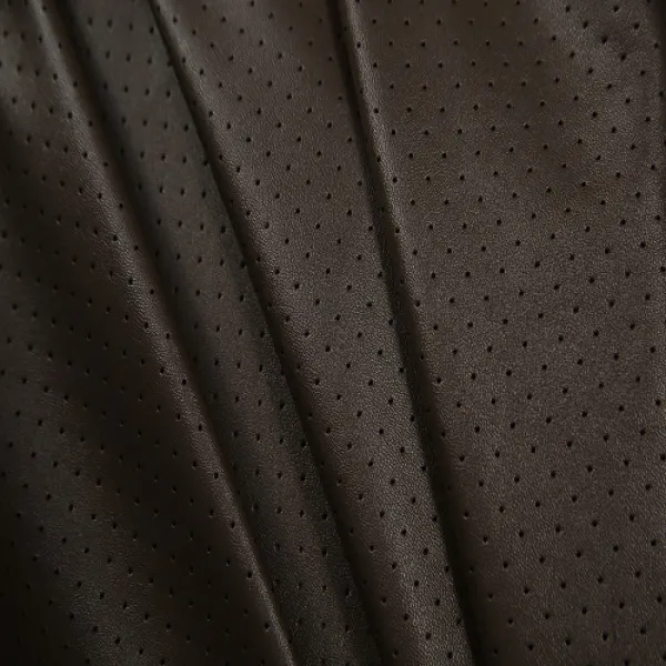 Ткань  Кожа искусственная, перфорация (шоколад) купить оптом в Беларуси